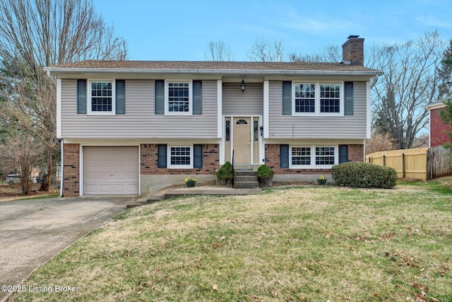 1123 Meadowridge Trl, Goshen, KY 40026 - raised ranch featuring brick siding, a chimney, driveway, and an attached garage