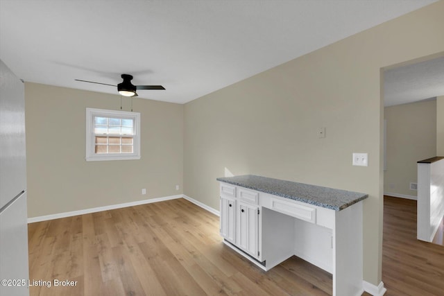 1123 Meadowridge Trl, Goshen, KY 40026 - spare room with light wood-style floors, ceiling fan, and a desk