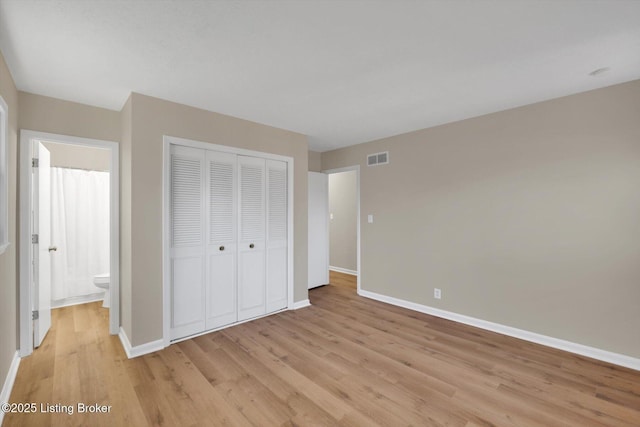 1123 Meadowridge Trl, Goshen, KY 40026 - unfurnished bedroom with light wood finished floors and a closet