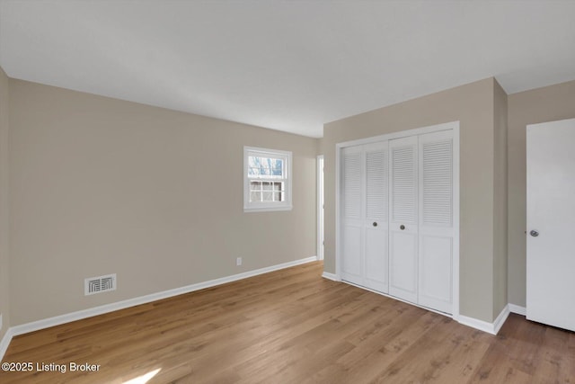 1123 Meadowridge Trl, Goshen, KY 40026 - unfurnished bedroom with wood finished floors and a closet