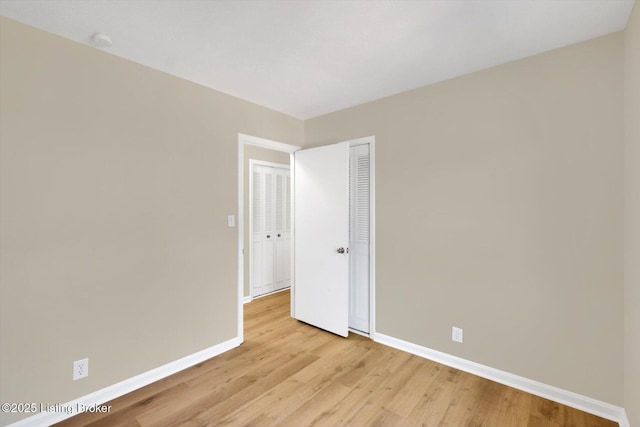 1123 Meadowridge Trl, Goshen, KY 40026 - unfurnished room featuring light wood finished floors and a smoke detector