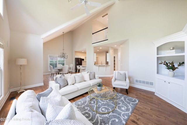 6205 Elizabeth Ct, Prospect, KY 40059 - living area featuring high vaulted ceiling, a chandelier, wood finished floors, and ceiling fan