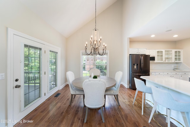 6205 Elizabeth Ct, Prospect, KY 40059 - dining room featuring a chandelier, dark wood-style flooring, high vaulted ceiling, and recessed lighting