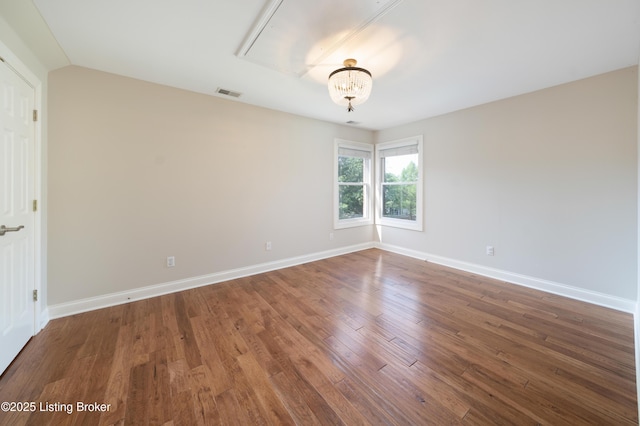 6205 Elizabeth Ct, Prospect, KY 40059 - unfurnished room with wood finished floors and a chandelier