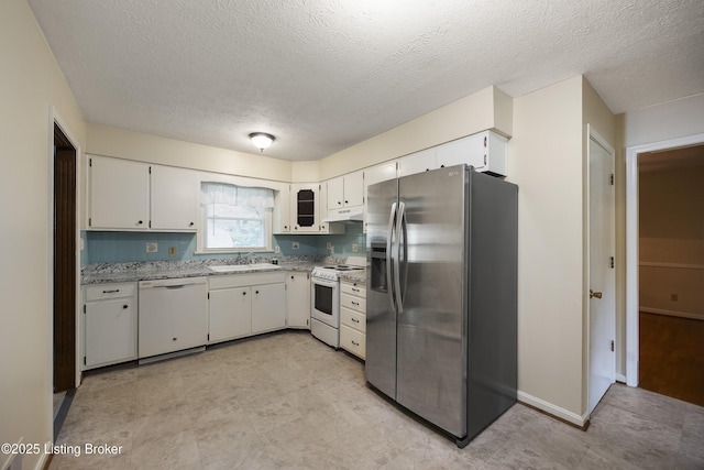 6704 Hollow Tree Rd, Louisville, KY 40228 - kitchen with white appliances, under cabinet range hood, a textured ceiling, white cabinets, and light stone countertops