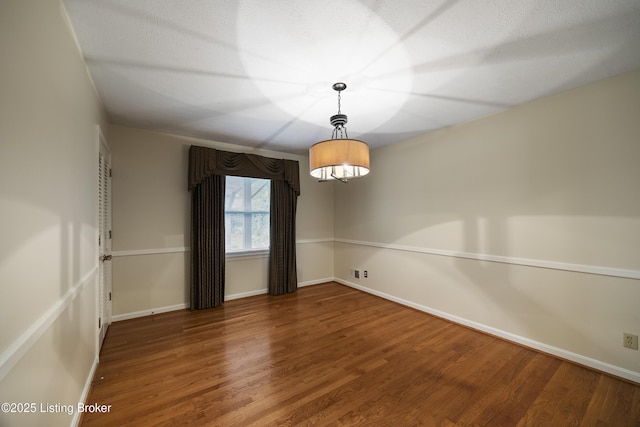 6704 Hollow Tree Rd, Louisville, KY 40228 - unfurnished room with wood finished floors and baseboards