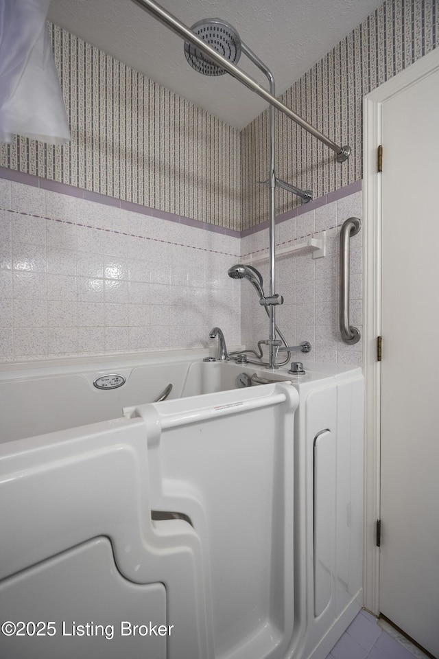 6704 Hollow Tree Rd, Louisville, KY 40228 - bathroom featuring wallpapered walls and a shower