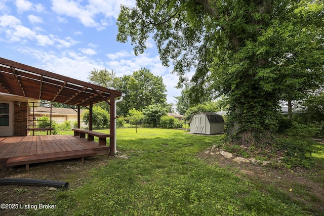 6704 Hollow Tree Rd, Louisville, KY 40228 - view of green lawn featuring a storage shed, a wooden deck, and a pergola