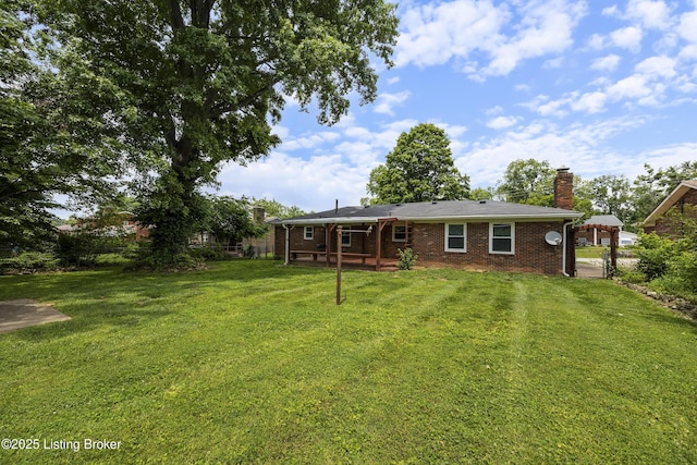 6704 Hollow Tree Rd, Louisville, KY 40228 - back of house featuring a chimney, brick siding, and a wooden deck
