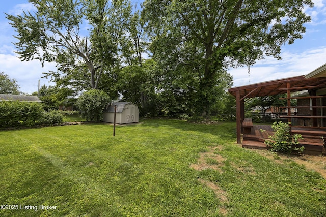 6704 Hollow Tree Rd, Louisville, KY 40228 - view of grassy yard with a shed and a deck