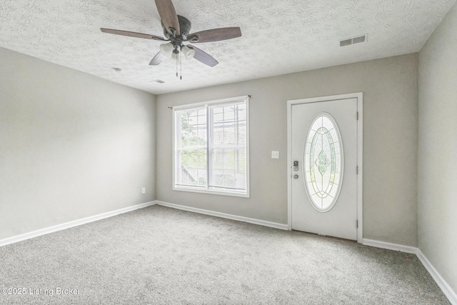 1796 Mellwood Ave, Louisville, KY 40206 - entrance foyer featuring carpet, a ceiling fan, and a textured ceiling