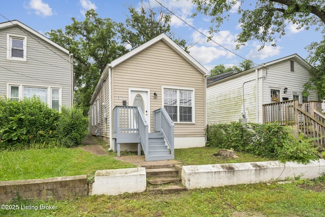 1796 Mellwood Ave, Louisville, KY 40206 - shotgun-style home featuring a front lawn