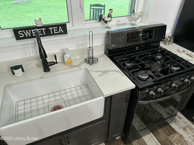 9115 Independence School Rd, Louisville, KY 40228 - kitchen with black range with gas cooktop and dark cabinetry