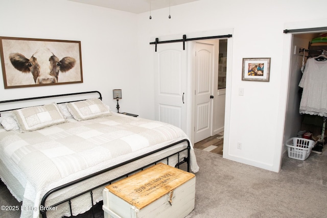 9115 Independence School Rd, Louisville, KY 40228 - bedroom with a barn door, a closet, and carpet flooring