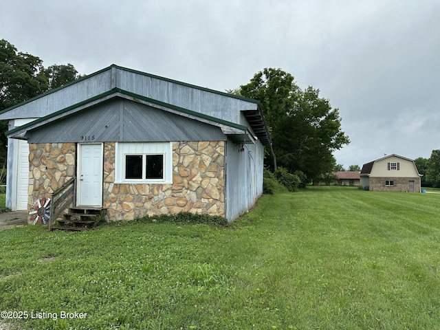 9115 Independence School Rd, Louisville, KY 40228 - back of house with entry steps, stone siding, and a lawn