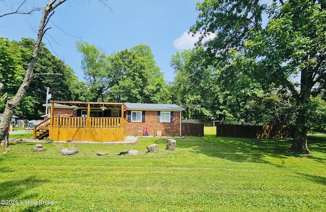 94 Buckhorn Ln, Leitchfield, KY 42754 - back of house featuring a wooden deck and brick siding