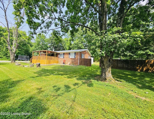 94 Buckhorn Ln, Leitchfield, KY 42754 - view of yard with a trampoline and a deck