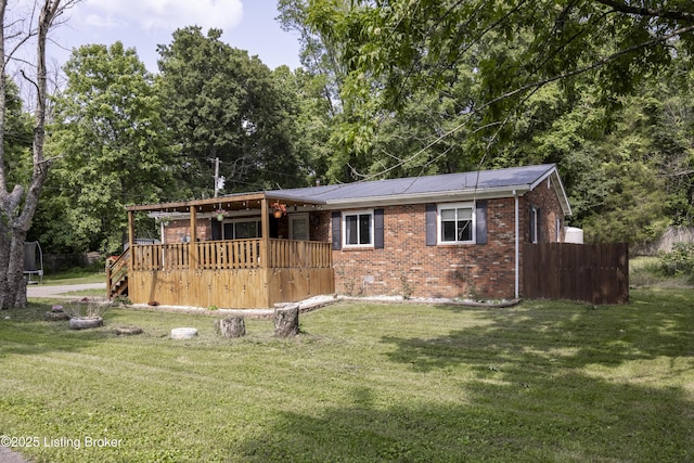 94 Buckhorn Ln, Leitchfield, KY 42754 - view of front of house featuring brick siding and a wooden deck