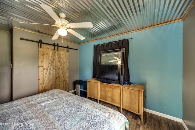 94 Buckhorn Ln, Leitchfield, KY 42754 - bedroom featuring a barn door, wood finished floors, and a ceiling fan