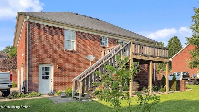 131 Benelli Dr, Bardstown, KY 40004 - back of property with a yard, brick siding, a deck, and stairway