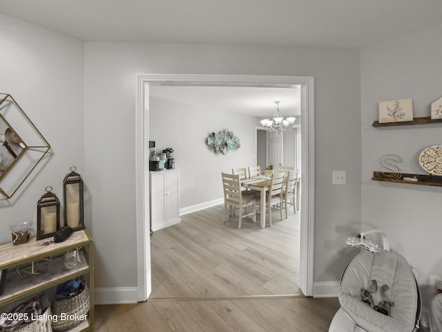 131 Benelli Dr, Bardstown, KY 40004 - hallway featuring a chandelier and wood finished floors