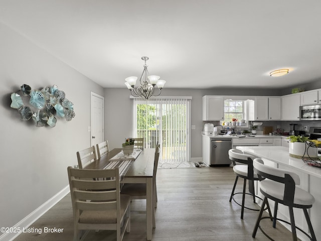 131 Benelli Dr, Bardstown, KY 40004 - dining room featuring a chandelier and light wood-style flooring