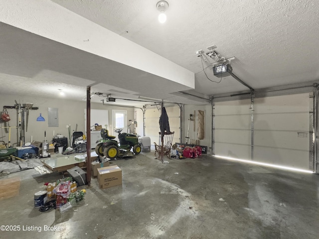 131 Benelli Dr, Bardstown, KY 40004 - garage featuring electric panel and a garage door opener
