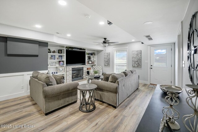 57 Pilots Way, Taylorsville, KY 40071 - living room featuring light wood finished floors, a ceiling fan, recessed lighting, and a fireplace