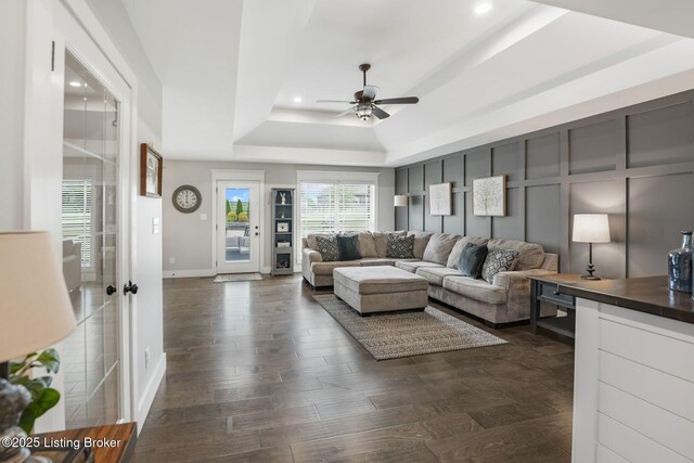 57 Pilots Way, Taylorsville, KY 40071 - living room featuring a raised ceiling, ceiling fan, recessed lighting, and dark wood-style floors