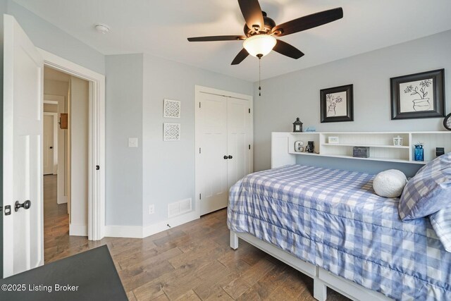 57 Pilots Way, Taylorsville, KY 40071 - bedroom with wood finished floors, a closet, and a ceiling fan