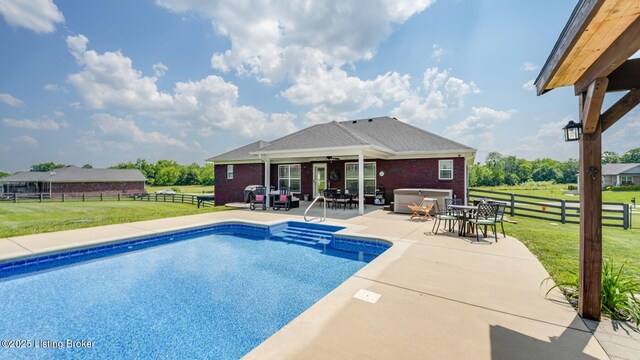 57 Pilots Way, Taylorsville, KY 40071 - swimming pool featuring a ceiling fan, a fenced backyard, a patio, and a hot tub