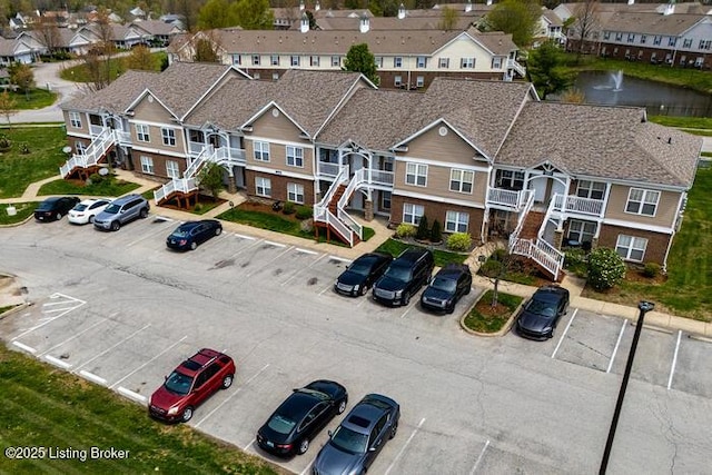 9003 Falcon Crest Ct Unit 104, Louisville, KY 40219 - aerial perspective of suburban area with a nearby body of water