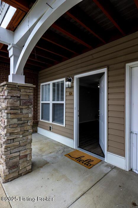 9003 Falcon Crest Ct Unit 104, Louisville, KY 40219 - entrance to property featuring a patio