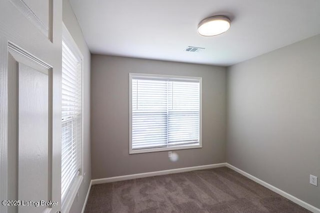 9003 Falcon Crest Ct Unit 104, Louisville, KY 40219 - carpeted spare room featuring baseboards