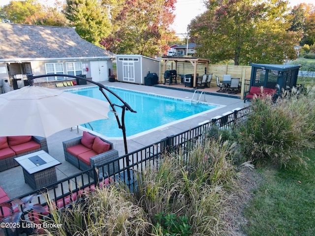 9003 Falcon Crest Ct Unit 104, Louisville, KY 40219 - view of pool featuring outdoor lounge area, a patio area, a pergola, and an outbuilding