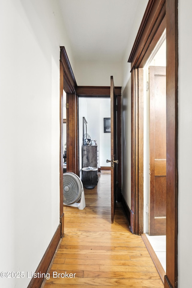 2618 S 5th St, Louisville, KY 40208 - corridor with baseboards and light wood-style floors