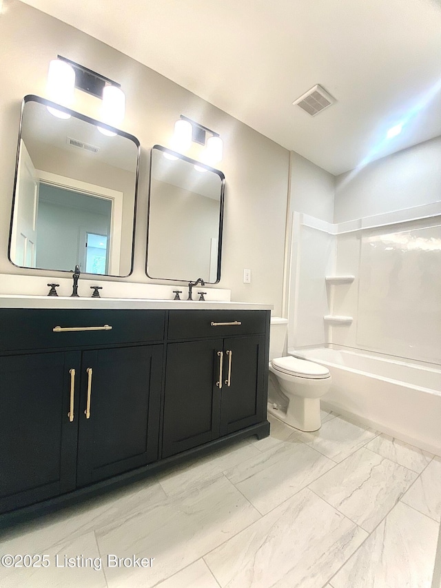 1711 Washington Blvd, Lyndon, KY 40242 - bathroom featuring double vanity, marble look tiles, and bathtub / shower combination