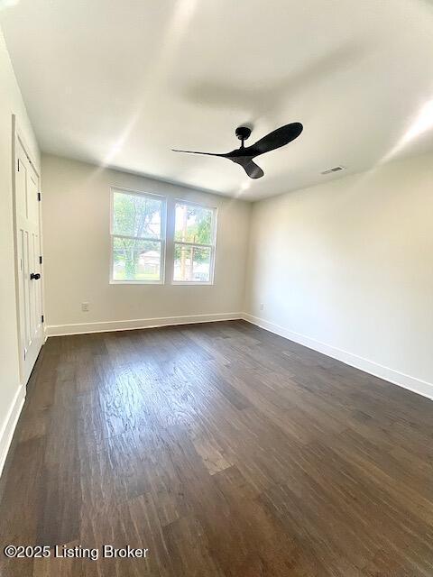 1711 Washington Blvd, Lyndon, KY 40242 - empty room with a ceiling fan and dark wood finished floors