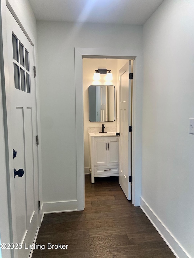 1711 Washington Blvd, Lyndon, KY 40242 - corridor with dark wood-type flooring and baseboards