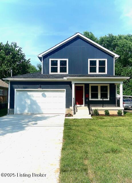 1711 Washington Blvd, Lyndon, KY 40242 - view of front facade featuring concrete driveway, a front lawn, covered porch, a garage, and board and batten siding