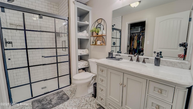 116 N Howard St, Bardstown, KY 40004 - full bath with a stall shower, vanity, a walk in closet, and tile patterned floors