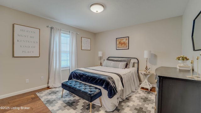 116 N Howard St, Bardstown, KY 40004 - bedroom with baseboards and light wood finished floors