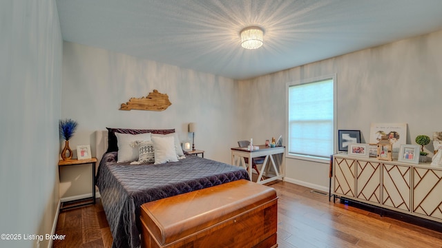 116 N Howard St, Bardstown, KY 40004 - bedroom with wood finished floors and baseboards