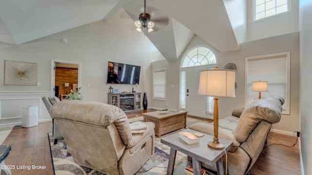 116 N Howard St, Bardstown, KY 40004 - living room with high vaulted ceiling, wood-type flooring, ceiling fan, and a glass covered fireplace
