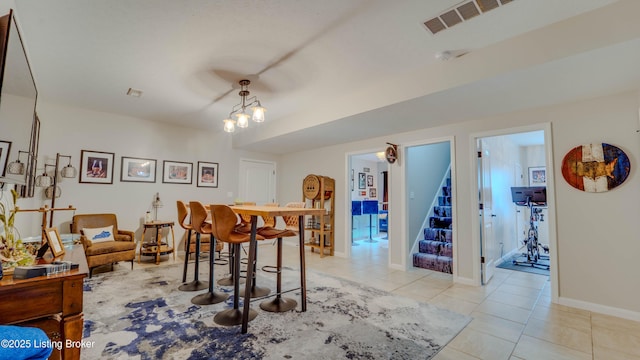 116 N Howard St, Bardstown, KY 40004 - dining area with stairs and light tile patterned floors