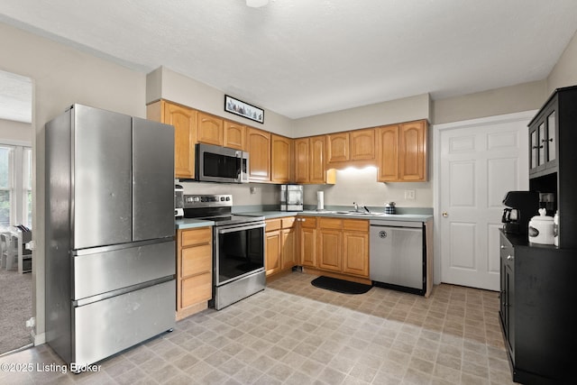 161 Sulphur Rd, New Castle, KY 40050 - kitchen with appliances with stainless steel finishes, light flooring, and light countertops