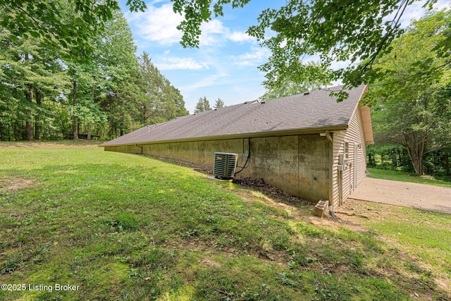 606 Lone Oak Rd, Clarkson, KY 42726 - view of property exterior featuring a yard and roof with shingles