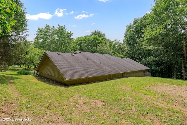 606 Lone Oak Rd, Clarkson, KY 42726 - view of side of property featuring a lawn and roof with shingles