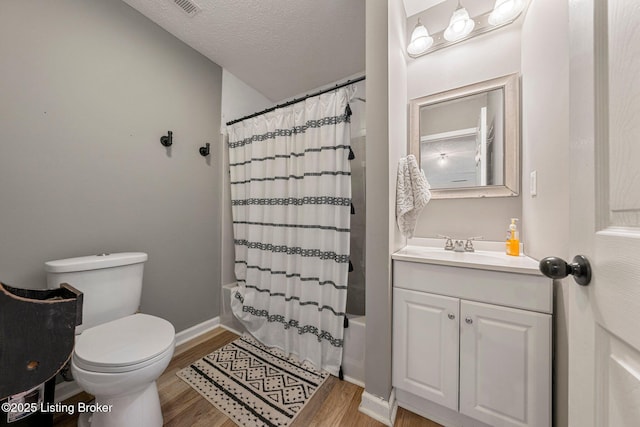 606 Lone Oak Rd, Clarkson, KY 42726 - full bath featuring wood finished floors, vanity, and shower / bath combination with curtain
