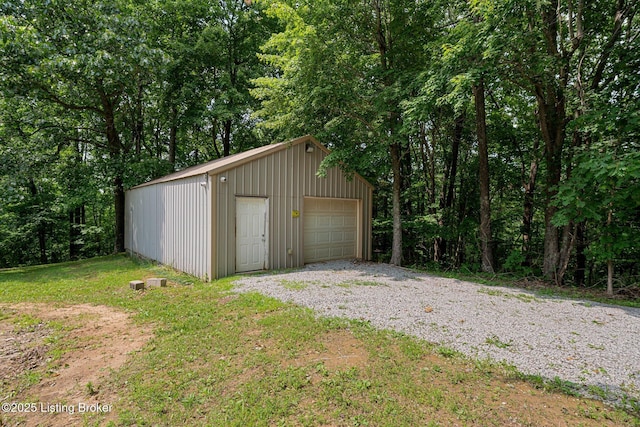 606 Lone Oak Rd, Clarkson, KY 42726 - detached garage featuring gravel driveway